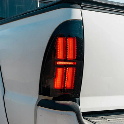 AlphaRex (NOVA-Series) 2005-2015 Toyota Tacoma Prismatic LED Tail Lights - Black