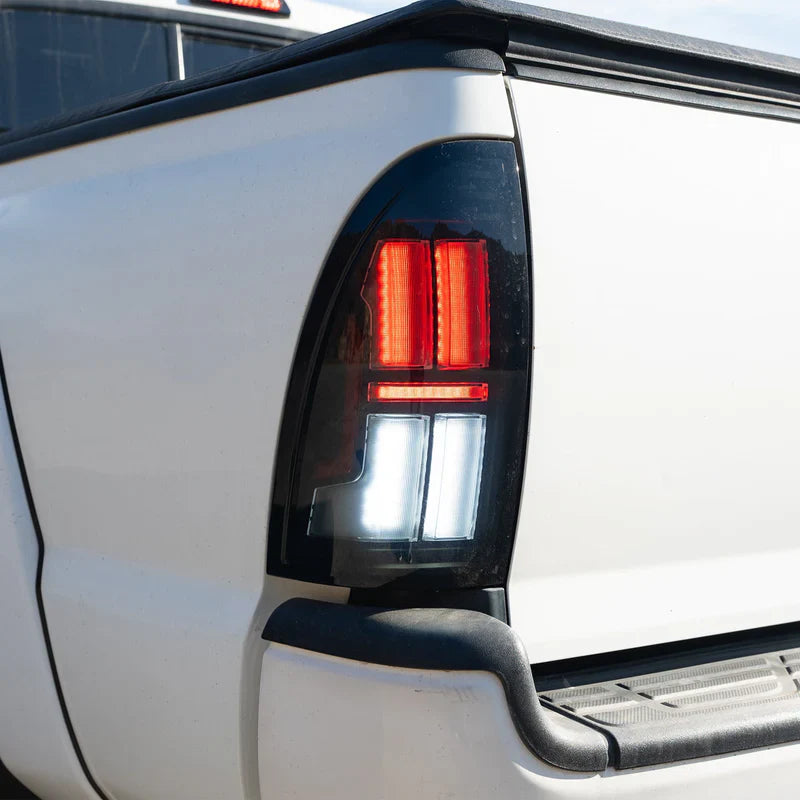AlphaRex (NOVA-Series) 2005-2015 Toyota Tacoma Prismatic LED Tail Lights - Alpha-Black