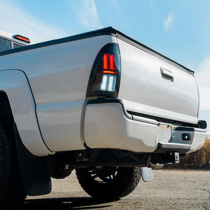 AlphaRex (NOVA-Series) 2005-2015 Toyota Tacoma Prismatic LED Tail Lights - Black